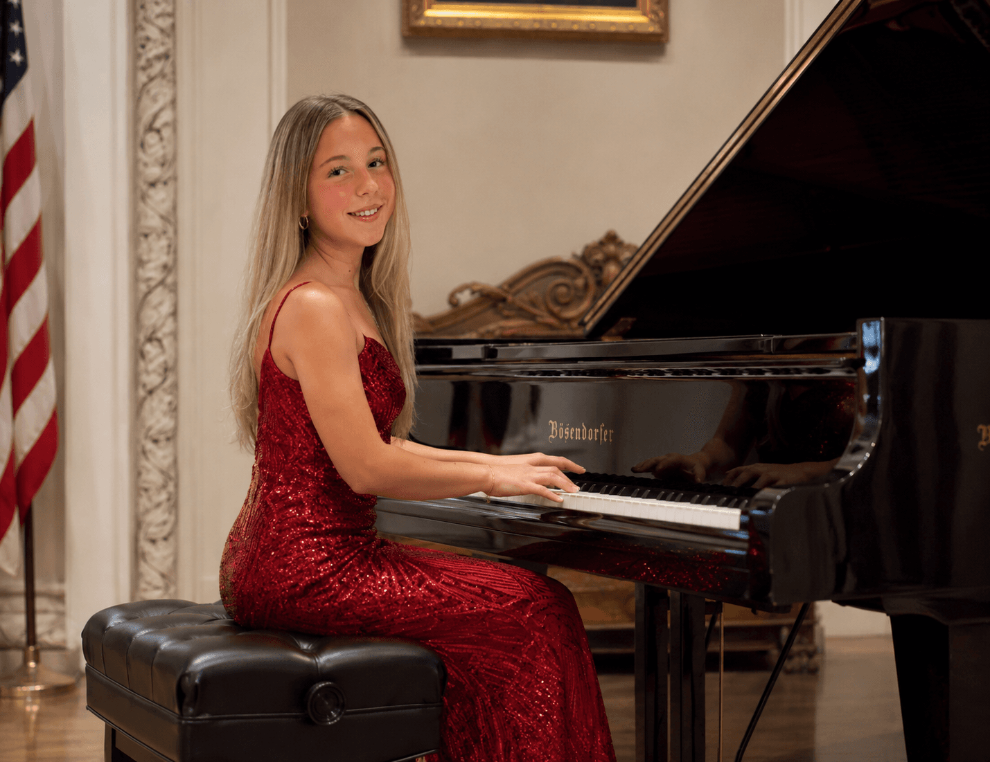 Anna Levitskiy, founder of Music & Smiles, at the piano